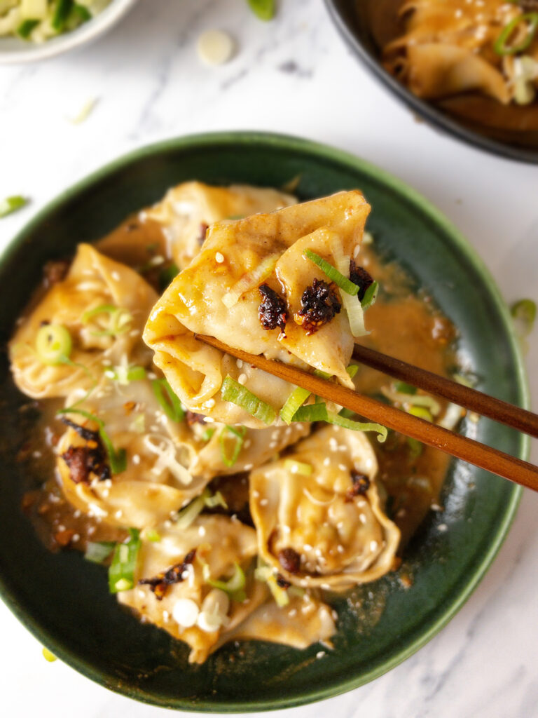 Wontons in Spicy Peanut Sauce 